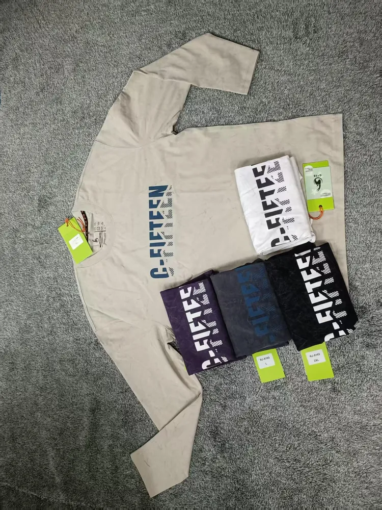 Sand C-Fifteen long-sleeve shirt with a stack of folded dark colourways