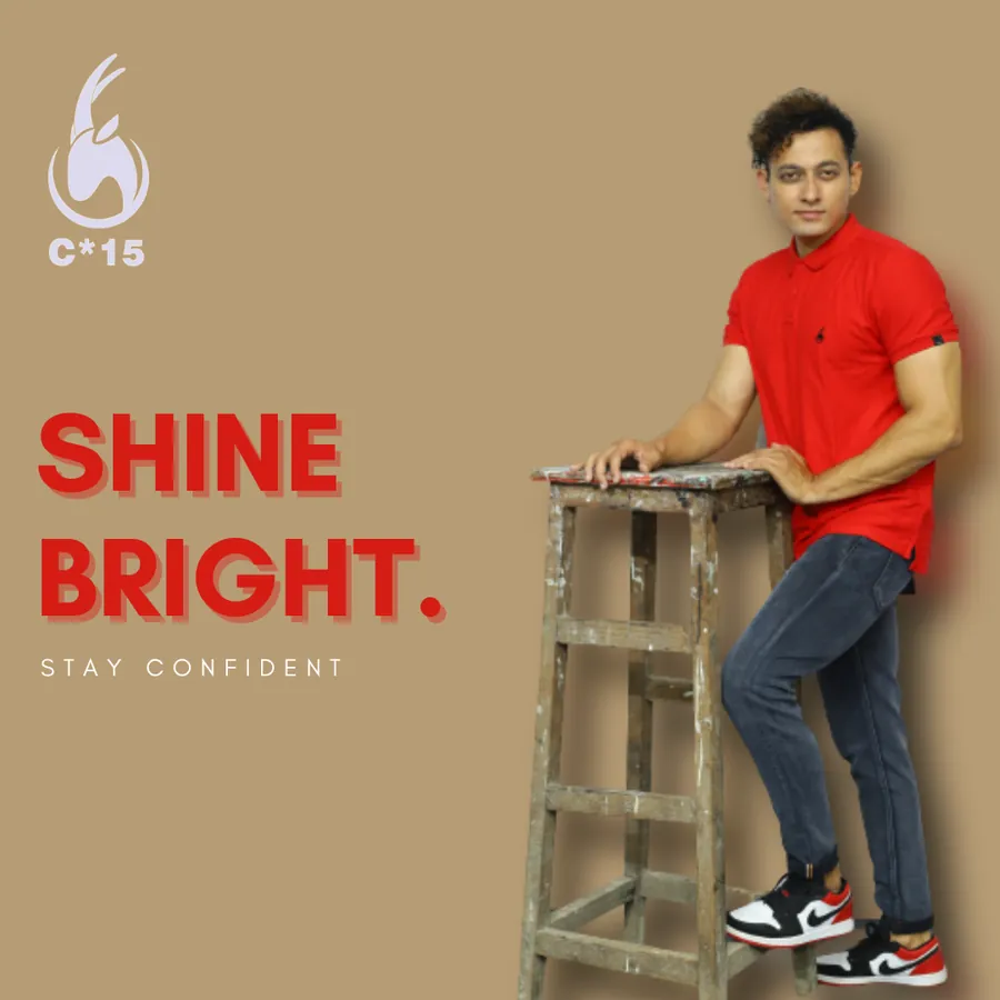 C-15 campaign poster of a model in a red polo and jeans on a wooden ladder with the words Shine Bright