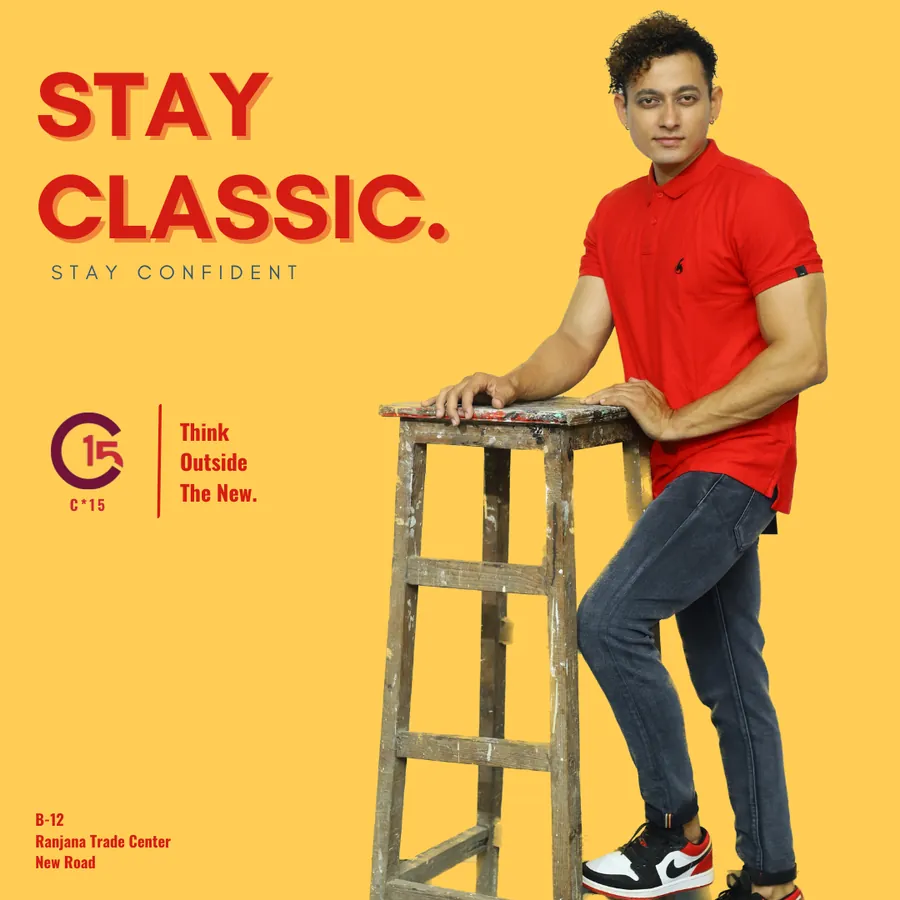C-15 Stay Classic campaign poster of a model in a red polo and dark jeans beside a wooden ladder on a yellow background