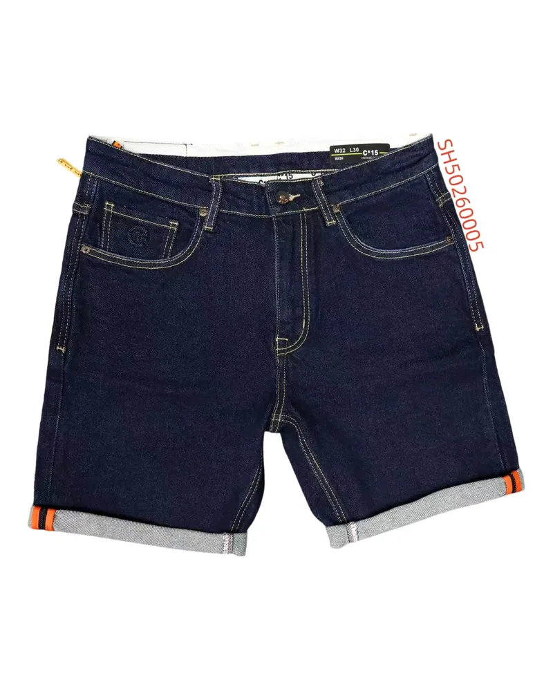 C-15 dark indigo denim half pants with rolled cuffs and orange tab on a white background
