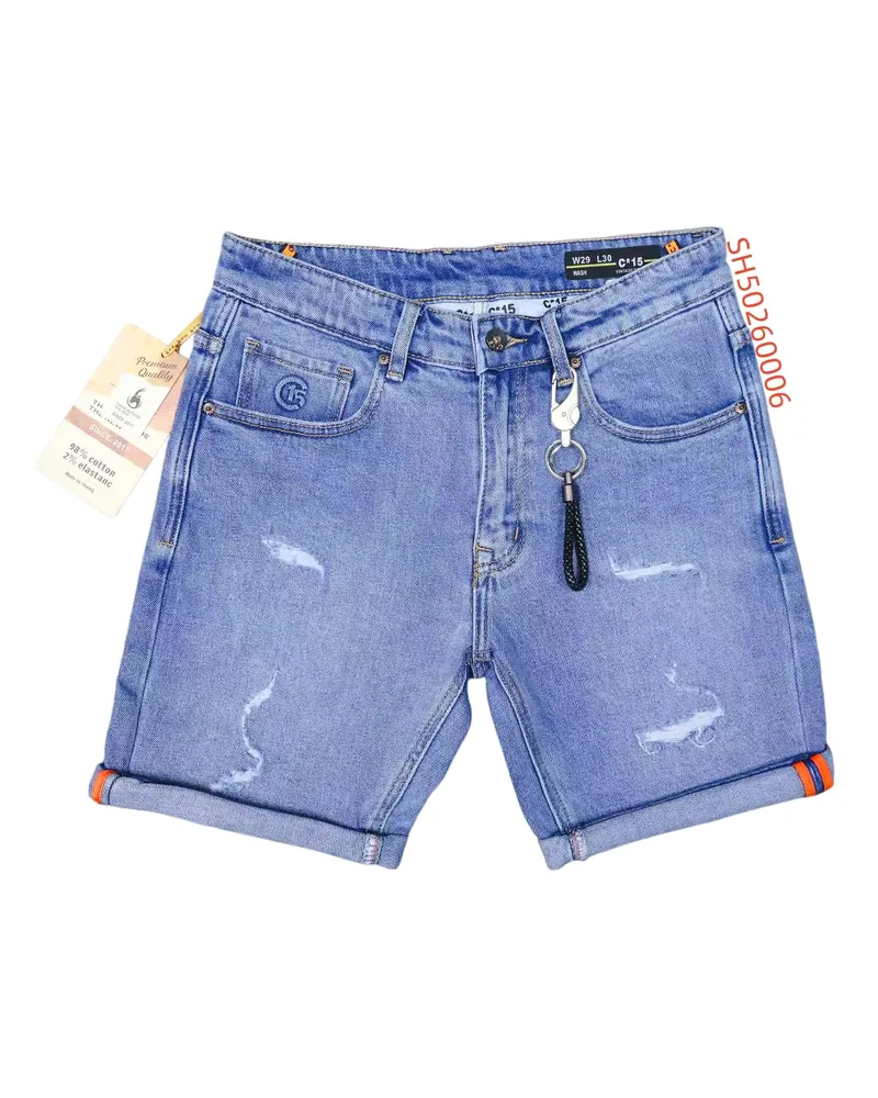 C-15 light-blue distressed denim half pants with tag on a white background